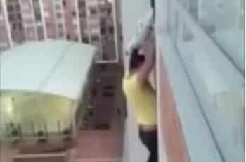 A Man Climbs a 13th Floor Building to Save a Dangling Dog2